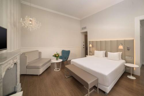 Habitación Doble Superior XL con vistas - 1 cama doble o 2 individuales del hotel Nh Genova Centro. Foto 1