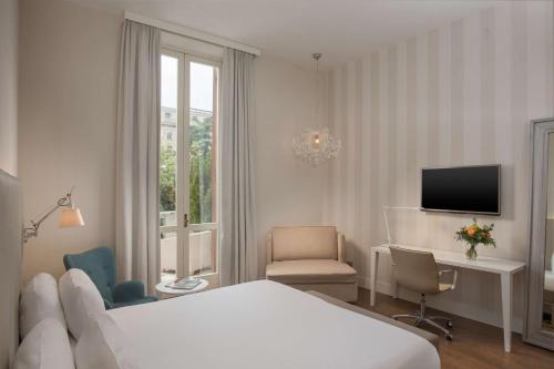 Habitación Doble Superior XL con vistas - 1 cama doble o 2 individuales del hotel Nh Genova Centro. Foto 2