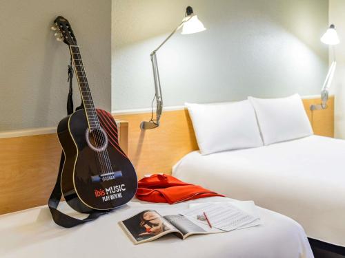 Habitación Triple Superior del hotel Ibis Milano Centro. Foto 3