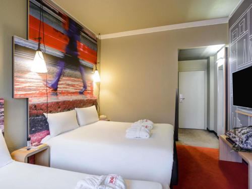 Habitación Triple Premium del hotel Ibis Milano Centro. Foto 2