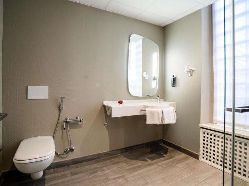 Habitación Triple Premium del hotel Ibis Milano Centro. Foto 5