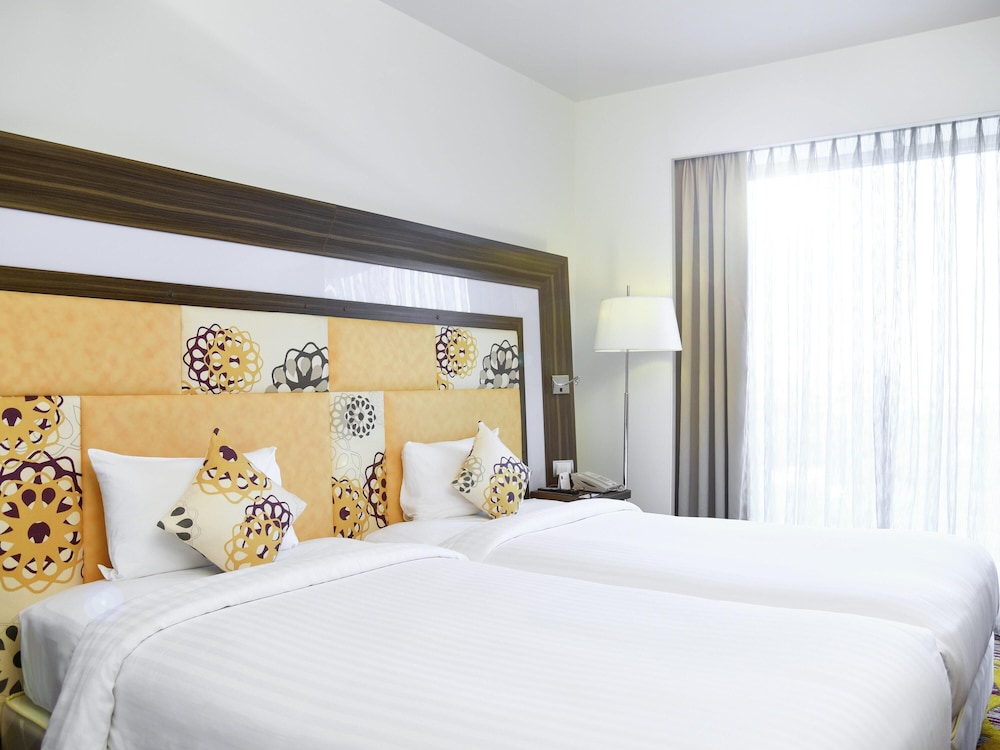 Habitación ejecutiva con 2 camas individuales, 2 camas individuales del hotel Novotel Pune Viman Nagar. Foto 2
