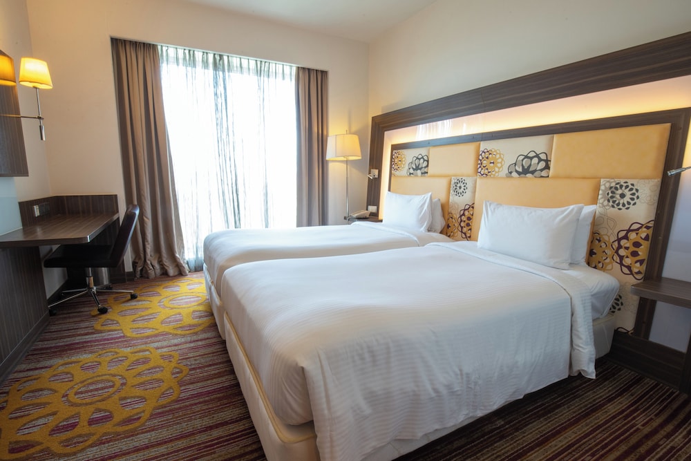 Habitación Deluxe con 2 camas individuales, 2 camas individuales del hotel Novotel Pune Viman Nagar. Foto 3