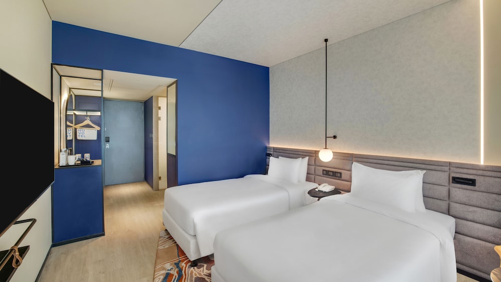 Habitación Premier con 2 camas individuales, 2 camas individuales del hotel Novotel Pune Viman Nagar. Foto 1