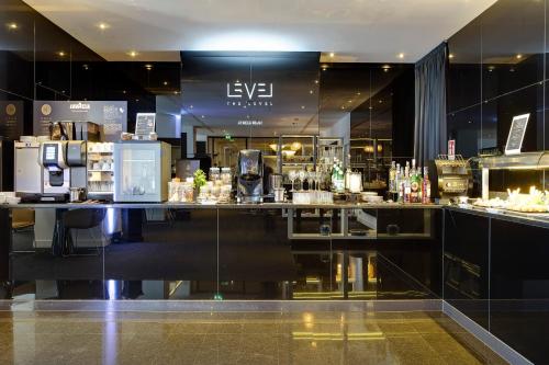 Suite Business The Level con acceso al salón del hotel Melia Milano