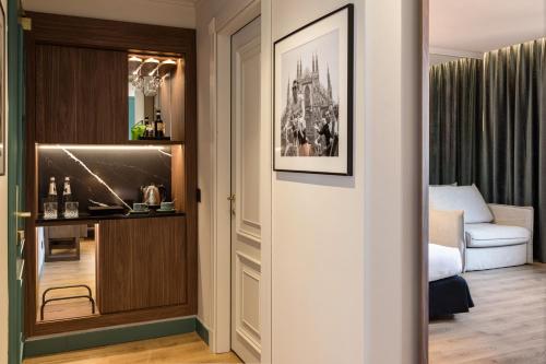 Habitación triple familiar del hotel Melia Milano. Foto 4