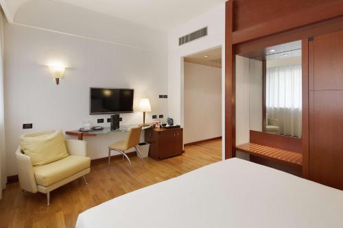Habitación Doble Superior del hotel Nh Milano Machiavelli. Foto 1