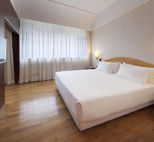Suite Junior con cama supletoria del hotel Nh Milano Machiavelli. Foto 1