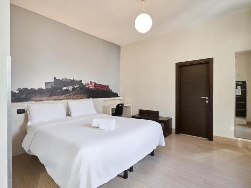 Habitación Triple del hotel B&B Napoli