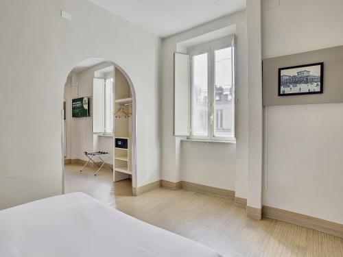 Habitación Triple del hotel B&B Napoli. Foto 5