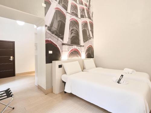 Habitación Doble - 2 camas del hotel B&B Napoli. Foto 6