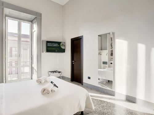 Habitación Cuádruple del hotel B&B Napoli. Foto 4
