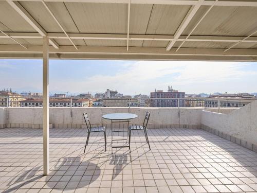 Habitación Triple con terraza del hotel B&B Napoli. Foto 2