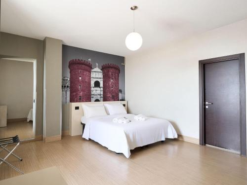 Habitación Cuádruple con terraza del hotel B&B Napoli. Foto 1