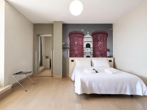 Habitación Cuádruple con terraza del hotel B&B Napoli. Foto 4