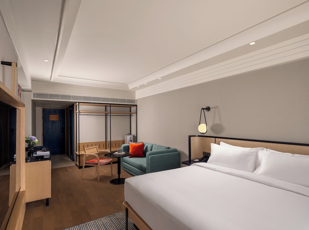 HABITACIÓN FAMILIAR CON 1 CAMA KING del hotel Pullman Chennai Anna Salai - Premium Brand By Accor. Foto 2