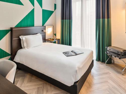 Habitación Individual Clásica del hotel Mercure Napoli Centro Angioino. Foto 11