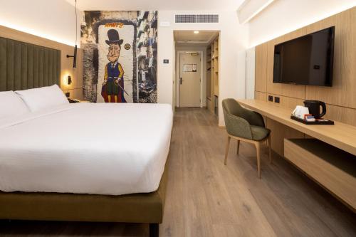 Habitación Premium con cama extragrande del hotel Holiday Inn Naples, An Ihg. Foto 3