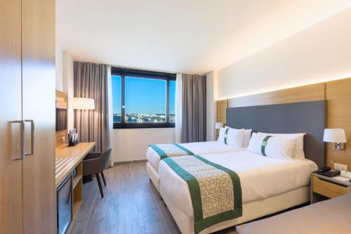 Habitación Doble Premium con sofá cama - 2 camas del hotel Holiday Inn Naples, An Ihg. Foto 6
