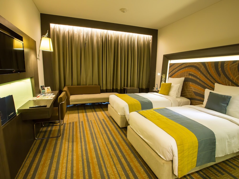 Habitación Superior con Dos Camas Individuales y WIFI del hotel Novotel Kolkata and Residences. Foto 2