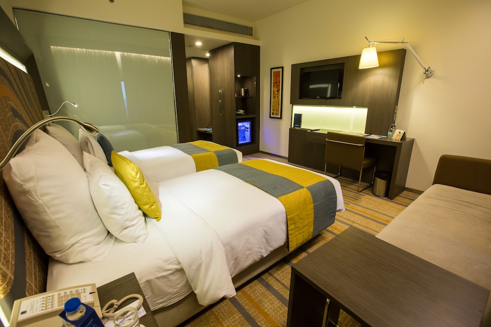 Habitación Premier con Dos Camas Individuales, Acceso al Salón Premier del hotel Novotel Kolkata and Residences. Foto 1