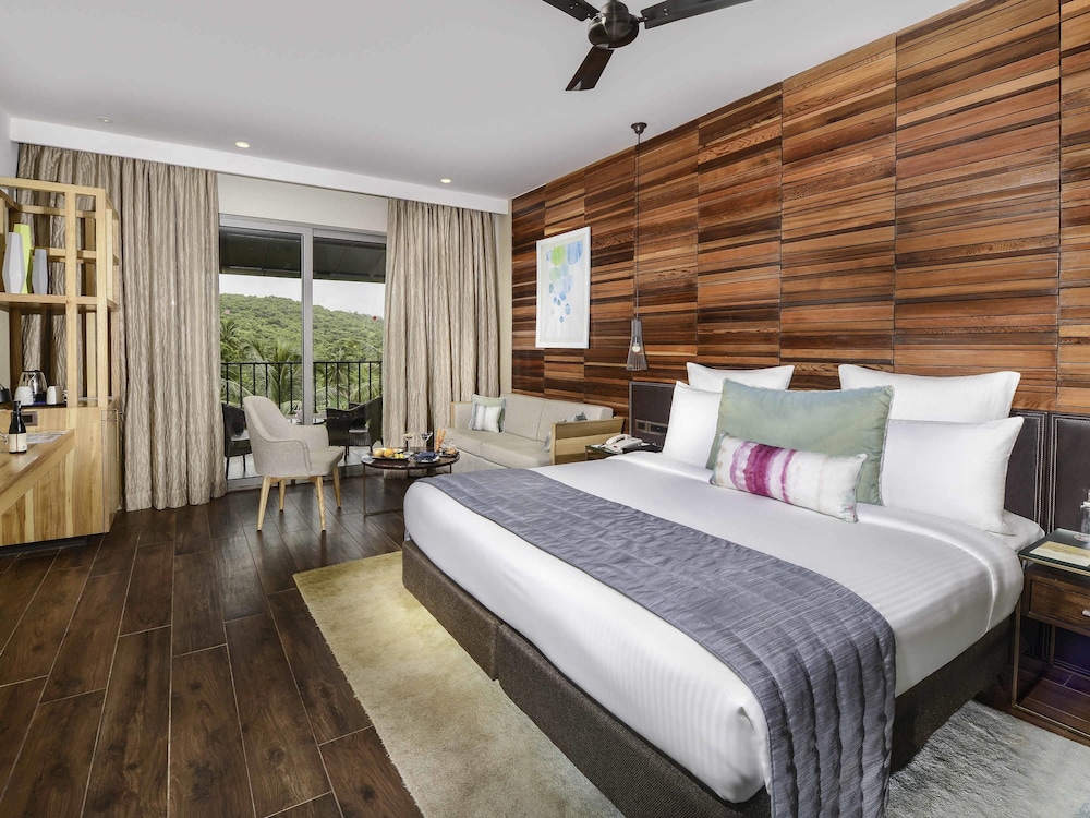 Luxury Twin con vistas a la piscina del hotel Novotel Goa Candolim