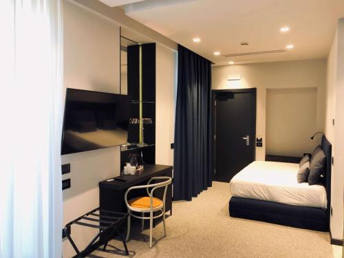 Suite Junior con terraza - Cama extragrande y cama grande del hotel Best Western Plaza