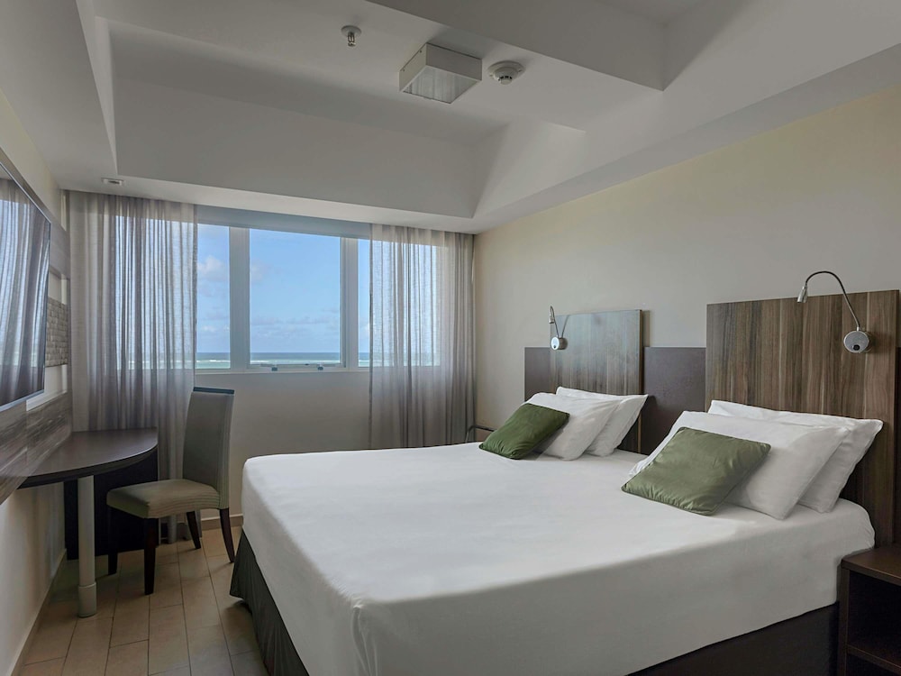 Habitación Superior con 1 cama doble y vistas al mar del hotel Mercure Maceio Pajucara. Foto 6