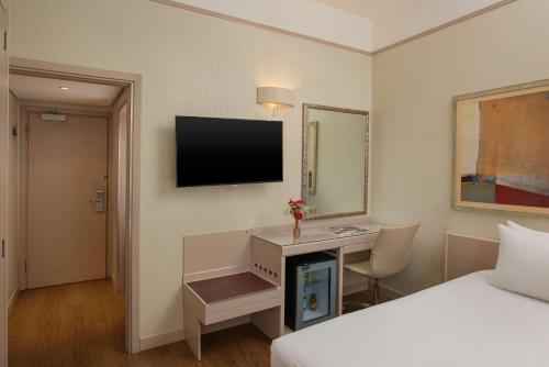 Habitación Individual Estándar del hotel Nh Pisa. Foto 1
