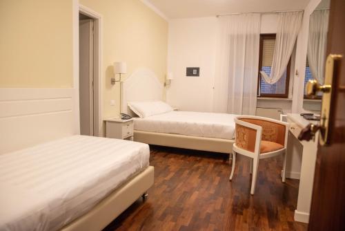 Habitación Triple del hotel Grand Duomo. Foto 4