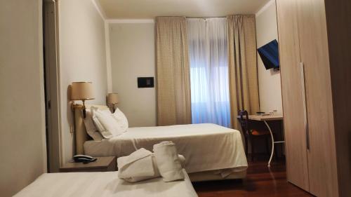 Habitación Triple del hotel Grand Duomo. Foto 6