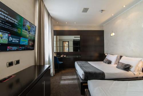 Habitación Triple del hotel Accademia. Foto 1