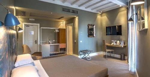Habitación cuádruple Club del hotel Accademia. Foto 3