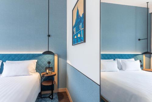 Habitación con cama extragrande. del hotel Hilton Garden Inn Rome Colosseum. Foto 6