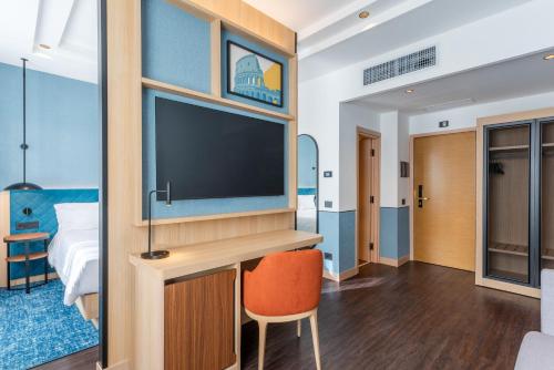 Suite Junior del hotel Hilton Garden Inn Rome Colosseum. Foto 9