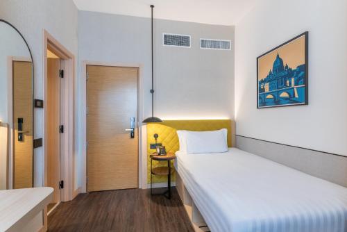 Habitación Individual del hotel Hilton Garden Inn Rome Colosseum. Foto 1