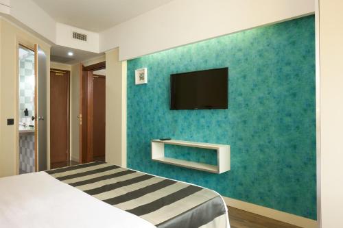 Habitación Triple Estándar del hotel Roma Tor Vergata