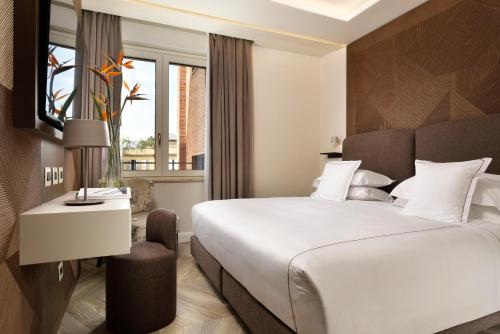 Habitación Executive Classic con vistas a la ciudad del hotel FH55 Grand Hotel Palatino. Foto 1