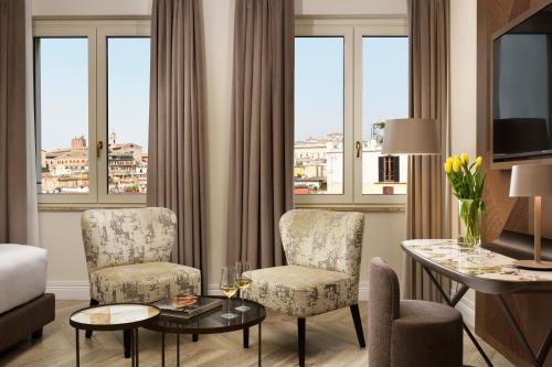 Habitación Executive Deluxe con vistas a la ciudad del hotel FH55 Grand Hotel Palatino. Foto 4
