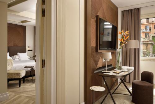Habitación Familiar Deluxe del hotel FH55 Grand Hotel Palatino. Foto 1