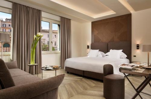 Habitación Familiar Deluxe del hotel FH55 Grand Hotel Palatino. Foto 4