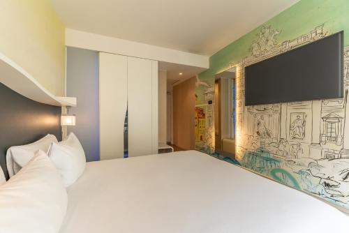 Habitación Doble Confort con cama grande del hotel Best Western Premier Royal Santina. Foto 2