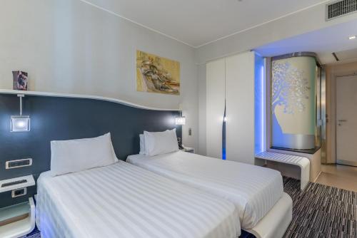 Habitación Doble Confort - 2 camas del hotel Best Western Premier Royal Santina. Foto 9