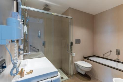 Habitación Deluxe con cama extragrande del hotel Best Western Premier Royal Santina. Foto 4