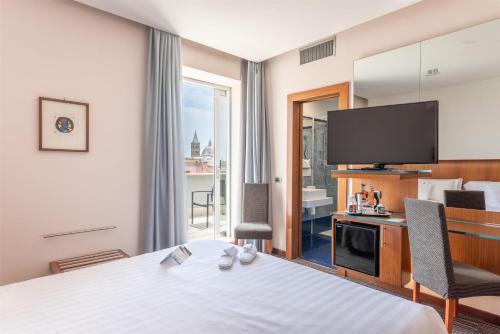 Habitación Superior con cama extragrande del hotel Best Western Plus Universo Roma