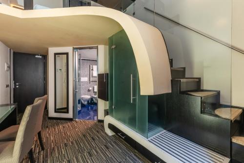 Habitación Deluxe con cama extragrande del hotel Best Western Plus Universo Roma. Foto 4