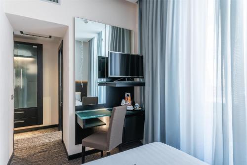 Habitación Individual Estándar del hotel Best Western Plus Universo Roma. Foto 1