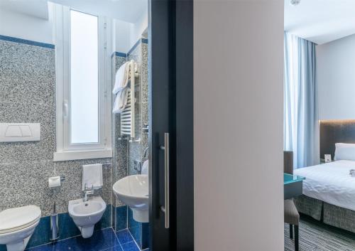 Habitación Individual Estándar del hotel Best Western Plus Universo Roma. Foto 3