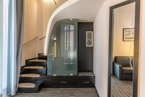 Suite Junior - en 2 niveles del hotel Best Western Plus Universo Roma. Foto 1