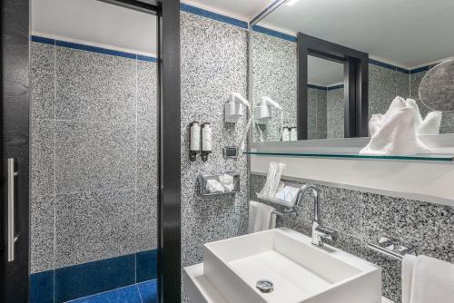 Suite Junior - en 2 niveles del hotel Best Western Plus Universo Roma. Foto 9